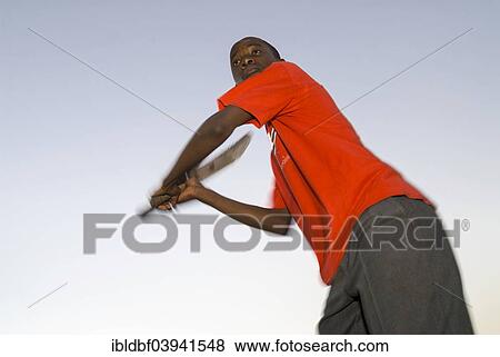"Boy playing cricket, Township, St. Lucia, St Lucia Estuary, Elephant Coast, KwaZulu-Natal, South Africa, Africa" View Large Photo Image Stock Photo - "Boy playing cricket, Township, St. Lucia, St Lucia Estuary, Elephant Coast, KwaZulu-Natal, South Africa, Africa". Fotosearch