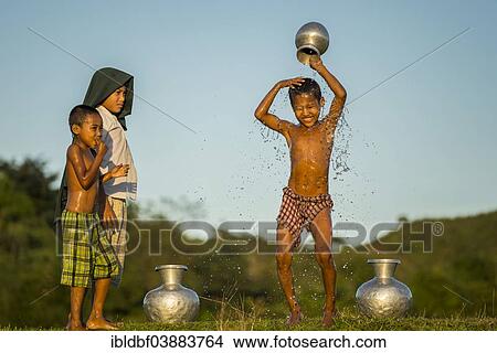 "Boy washing himself, Mrauk U, Sittwe Division, Rakhine State, Myanmar, Asia" View Large Photo Image Picture - "Boy washing himself, Mrauk U, Sittwe Division, Rakhine State, Myanmar, Asia". Fotosearch