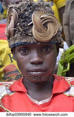 "Boy wearing a traditional headdress, portrait, Nkala, Bandundu Province, Democratic Republic of the Congo" View Large Photo Image Stock Image - "Boy wearing a traditional headdress, portrait, Nkala, Bandundu Province, Democratic Republic of the Congo". Fotosearch