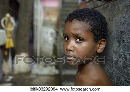 "Boy with a suspicious expression in a slum or favela, Jacarezinho favela, Rio de Janeiro, Rio de Janeiro State, Brazil, South America" View Large Photo Image Picture - "Boy with a suspicious expression in a slum or favela, Jacarezinho favela, Rio de Janeiro, Rio de Janeiro State, Brazil, South America". Fotosearch
