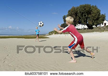 "Boys playing football on the beach, Churchhaven, Western Cape, South Africa, Africa" View Large Photo Image Stock Image - "Boys playing football on the beach, Churchhaven, Western Cape, South Africa, Africa". Fotosearch