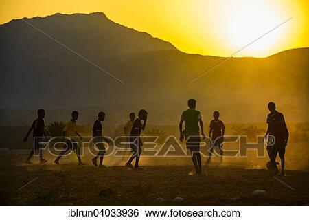 "Boys playing soccer, Socotra, Yemen, Asia" View Large Photo Image Stock Photograph - "Boys playing soccer, Socotra, Yemen, Asia". Fotosearch
