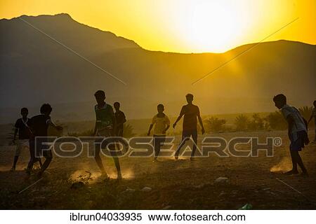 "Boys playing soccer, Socotra, Yemen, Asia" View Large Photo Image Stock Photography - "Boys playing soccer, Socotra, Yemen, Asia". Fotosearch