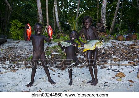 "Boys proudly showing the fish they caught, Marovo Lagoon, Western Province, Solomon Islands, Oceania" View Large Photo Image Stock Image - "Boys proudly showing the fish they caught, Marovo Lagoon, Western Province, Solomon Islands, Oceania". Fotosearch