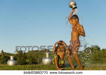 "Boys washing themselves, Mrauk U, Sittwe Division, Rakhine State, Myanmar, Asia" View Large Photo Image Stock Image - "Boys washing themselves, Mrauk U, Sittwe Division, Rakhine State, Myanmar, Asia". Fotosearch