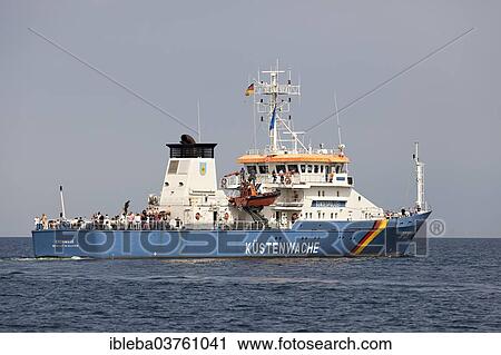 "BP 26 """"Eschwege"""", coast guard ship, at the Hanse Sail 2013, Baltic Sea near the entrance to the port, Warnemunde, Rostock, Mecklenburg-Western Pomerania, Germany, Europe" View Large Photo Image Stock Image - "BP 26 """"Eschwege"""", coast guard ship, at the Hanse Sail 2013, Baltic Sea near the entrance to the port, Warnemunde, Rostock, Mecklenburg-Western Pomerania, Germany, Europe". Fotosearch