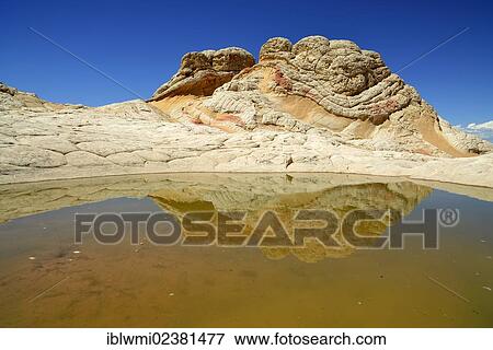 Stock Photo - "Brain Rocks at White Pocket, eroded Navajo sandstone rocks with Liesegang bands or Liesegang rings, Pareah Paria Plateau, Vermillion Cliffs National Monument, Arizona, Utah, Southwestern USA, USA". Fotosearch