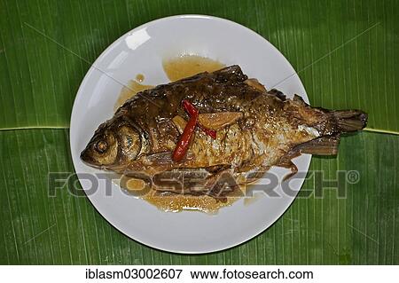 Stock Photo - Braised Thai-style carp. Fotosearch