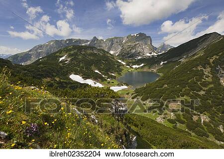 Picture - "Brandenberg Alps and lake Zireiner See, Tyrol, Austria, Europe". Fotosearch
