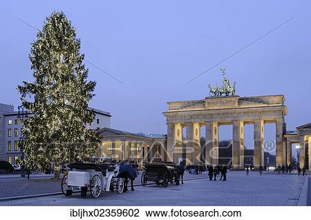 Stock Image - "Brandenburg Gate and a Christmas tree, Advent season, Pariser Platz square, Berlin, Germany, Europe". Fotosearch