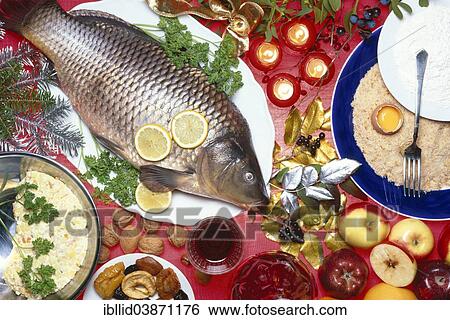 "Breaded Christmas carp with potato salad, ingredients, Christmas decorations" View Large Photo Image Stock Photograph - "Breaded Christmas carp with potato salad, ingredients, Christmas decorations". Fotosearch