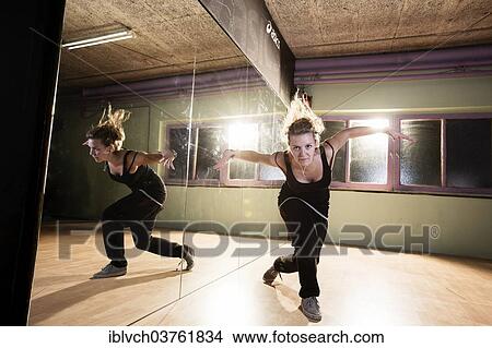 "Breakdancer dancing in front of a mirror wall, Terfens, Tyrol, Austria, Europe" View Large Photo Image Picture - "Breakdancer dancing in front of a mirror wall, Terfens, Tyrol, Austria, Europe". Fotosearch