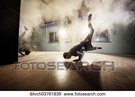 "Breakdancer dancing in front of a mirror wall, Terfens, Tyrol, Austria, Europe" View Large Photo Image Stock Photo - "Breakdancer dancing in front of a mirror wall, Terfens, Tyrol, Austria, Europe". Fotosearch