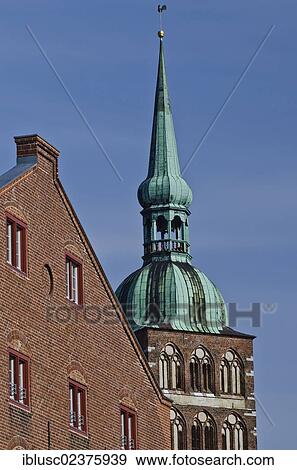 "Brick gable with the south tower of the St. Nikolai church at back, Stralsund, Mecklenburg-Western Pomerania, Germany, Europe" View Large Photo Image Stock Photo - "Brick gable with the south tower of the St. Nikolai church at back, Stralsund, Mecklenburg-Western Pomerania, Germany, Europe". Fotosearch