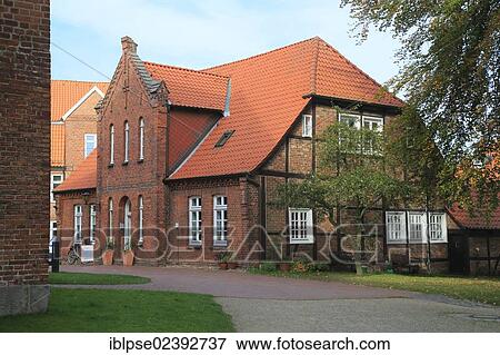 "Brick house behind the Church of St. Michaelis, Eutin, Holstein Switzerland, Schleswig-Holstein, Germany, Europe" View Large Photo Image Stock Photo - "Brick house behind the Church of St. Michaelis, Eutin, Holstein Switzerland, Schleswig-Holstein, Germany, Europe". Fotosearch