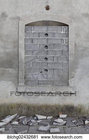 Stock Image - "Bricked-up window, abandoned house, Puy de Dome, Auvergne, France, Europe". Fotosearch