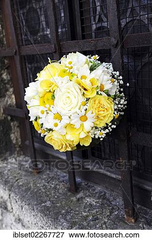 Bridal bouquet on an old rusty grid View Large Photo Image Stock Photo - Bridal bouquet on an old rusty grid. Fotosearch