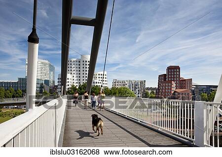 Stock Photo - "Bridge at Medienhafen, media harbour, Dusseldorf, Rhineland, North Rhine-Westphalia, Germany, Europe". Fotosearch