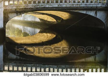 Stock Photo - "Bridge casting shadows over the Central Channel, Aveiro, Centro region, Portugal, Europe". Fotosearch
