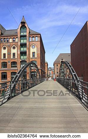 "Bridge crossing a fleet with old buildings in the Speicherstadt, the historic warehouse district, Hanseatic City of Hamburg, Germany, Europe" View Large Photo Image Picture - "Bridge crossing a fleet with old buildings in the Speicherstadt, the historic warehouse district, Hanseatic City of Hamburg, Germany, Europe". Fotosearch
