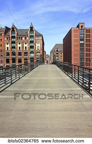 "Bridge crossing a fleet with old buildings in the Speicherstadt, the historic warehouse district, Hanseatic City of Hamburg, Germany, Europe" View Large Photo Image Stock Photography - "Bridge crossing a fleet with old buildings in the Speicherstadt, the historic warehouse district, Hanseatic City of Hamburg, Germany, Europe". Fotosearch