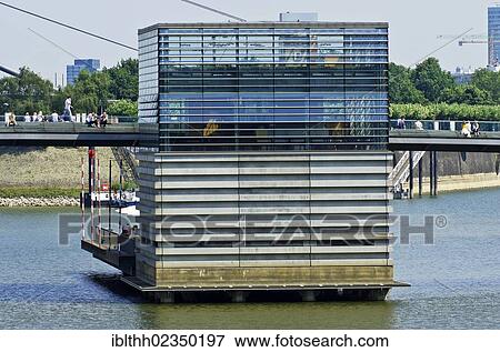 "Bridge house in the shape of a cube, Duesseldorf harbour, Medienhafen harbour, Duesseldorf, Rhineland, North-Rhine Westphalia, Germany, Europe" View Large Photo Image Stock Photo - "Bridge house in the shape of a cube, Duesseldorf harbour, Medienhafen harbour, Duesseldorf, Rhineland, North-Rhine Westphalia, Germany, Europe". Fotosearch