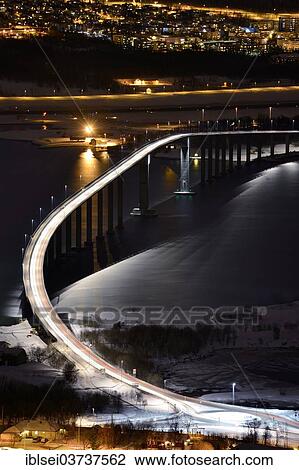 "Bridge over fjord at night, Sommeroya, Tromso, ‪Troms, Northern Norway, Norway, Europe" View Large Photo Image Stock Image - "Bridge over fjord at night, Sommeroya, Tromso, ‪Troms, Northern Norway, Norway, Europe". Fotosearch