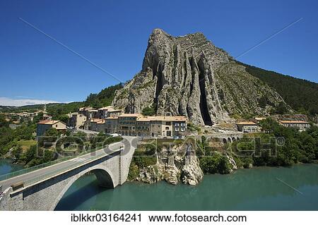 Stock Image - "Bridge over the Durance River, Sisteron, Provence, Region Provence-Alpes-Cote d? ÇÖAzur, France, Europe". Fotosearch