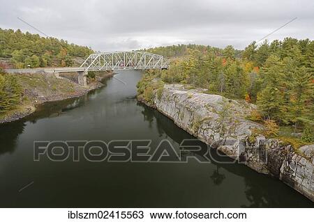Stock Image - Bridge over the French River, Ontario, Canada, North America. Fotosearch