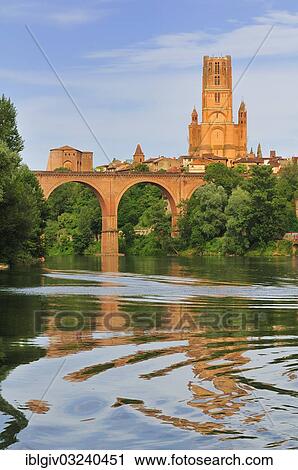 "Bridge over the Tarn River, in front of Albi Cathedral, formally the Cathedral of Saint Cecilia, Cathedrale Sainte-Cecile d'Albi, historic center, Albi, Departement Tarn, Midi-Pyrenees, France, Europe" View Large Photo Image Stock Image - "Bridge over the Tarn River, in front of Albi Cathedral, formally the Cathedral of Saint Cecilia, Cathedrale Sainte-Cecile d'Albi, historic center, Albi, Departement Tarn, Midi-Pyrenees, France, Europe". Fotosearch