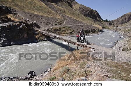 Stock Image - "Bridge, Pamir Highway, M41, Osh, Kyrgyzstan, Asia". Fotosearch