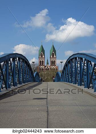 "Bridge with a view towards the Sacred Heart Church, Stuehlinger district, Freiburg, Baden-Wuerttemberg, Germany, Europe" View Large Photo Image Stock Image - "Bridge with a view towards the Sacred Heart Church, Stuehlinger district, Freiburg, Baden-Wuerttemberg, Germany, Europe". Fotosearch