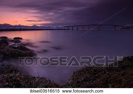 Stock Photography - "Bridge with fjord in the evening light, Sommeroya, Tromso, â€ªTroms, Northern Norway, Norway, Europe". Fotosearch