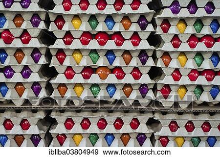 "Brightly colored Easter eggs stacked in cardboard boxes, Beham egg dyeing company, Thannhausen, Bayern, Germany, Europe" View Large Photo Image Stock Photo - "Brightly colored Easter eggs stacked in cardboard boxes, Beham egg dyeing company, Thannhausen, Bayern, Germany, Europe". Fotosearch