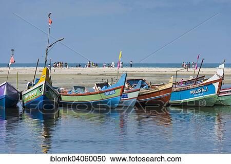 "Brightly painted fishing boats and people on the beach, near Alappuzha, Kerala, India, Asia" View Large Photo Image Stock Image - "Brightly painted fishing boats and people on the beach, near Alappuzha, Kerala, India, Asia". Fotosearch
