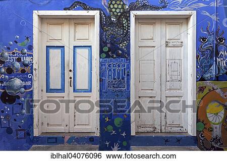 "Brightly painted house wall with two doors, La Calera, Valle Gran Rey, La Gomera, Canary Islands, Spain, Europe" View Large Photo Image Stock Photograph - "Brightly painted house wall with two doors, La Calera, Valle Gran Rey, La Gomera, Canary Islands, Spain, Europe". Fotosearch