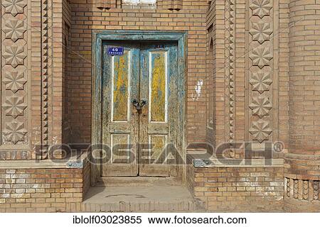 "Brightly painted old wooden door, Uyghur Muslim Quarter, Kashgar, Seidenstrasse, Xinjiang, China, People's Republic of China, Asia" View Large Photo Image Stock Photography - "Brightly painted old wooden door, Uyghur Muslim Quarter, Kashgar, Seidenstrasse, Xinjiang, China, People's Republic of China, Asia". Fotosearch