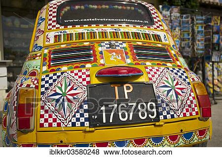 Stock Photo - "Brightly painted vintage Fiat, Sicily, Italy, Europe". Fotosearch