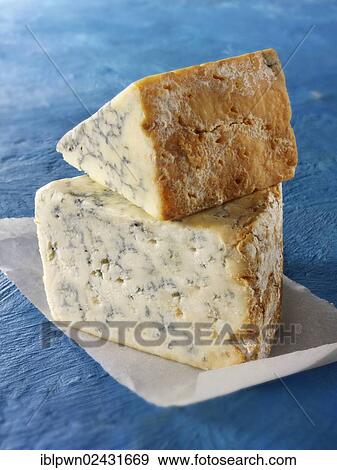 "British blue cheese, creamy Stilton, down, and Stilton, above" View Large Photo Image Stock Photo - "British blue cheese, creamy Stilton, down, and Stilton, above". Fotosearch