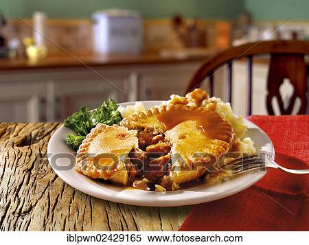 "British food, beef steak in ale pie and mashed potatoes" View Large Photo Image Stock Photography - "British food, beef steak in ale pie and mashed potatoes". Fotosearch