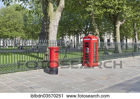 Stock Image - "British red letter box and public telephone box, Greenwich, London, London region, England, United Kingdom, Europe". Fotosearch