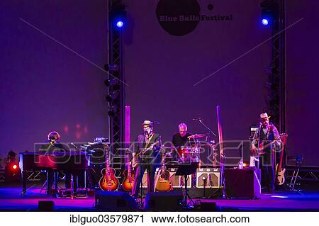 "British singer-songwriter Elvis Costello and his band, performing live at the Blue Balls Festival, Luzerner Saal KKL concert hall, Luzern, Canton of Lucerne, Switzerland, Europe" View Large Photo Image Stock Image - "British singer-songwriter Elvis Costello and his band, performing live at the Blue Balls Festival, Luzerner Saal KKL concert hall, Luzern, Canton of Lucerne, Switzerland, Europe". Fotosearch
