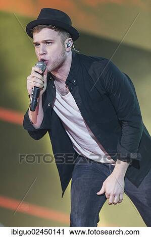 "British singer-songwriter Oliver Stanley, alias Olly Murs, performing live at Energy Stars For Free in Hallenstadion, Zurich, Switzerland, Europe" View Large Photo Image Stock Image - "British singer-songwriter Oliver Stanley, alias Olly Murs, performing live at Energy Stars For Free in Hallenstadion, Zurich, Switzerland, Europe". Fotosearch
