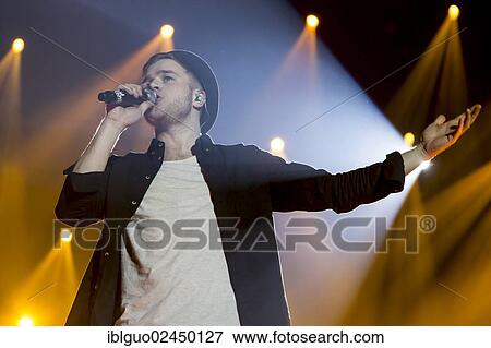 Stock Photo - "British singer-songwriter Oliver Stanley, alias Olly Murs, performing live at Energy Stars For Free in Hallenstadion, Zurich, Switzerland, Europe". Fotosearch