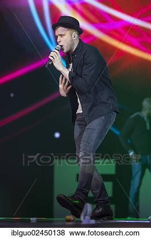 "British singer-songwriter Oliver Stanley, alias Olly Murs, performing live at Energy Stars For Free in Hallenstadion, Zurich, Switzerland, Europe" View Large Photo Image Stock Photo - "British singer-songwriter Oliver Stanley, alias Olly Murs, performing live at Energy Stars For Free in Hallenstadion, Zurich, Switzerland, Europe". Fotosearch