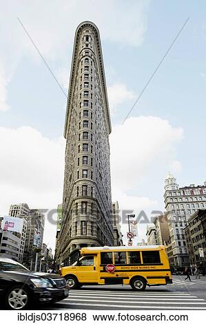 "Broadway with a school bus and the Flatiron Building, Manhattan, New York City, New York, United States, North America" View Large Photo Image Stock Photo - "Broadway with a school bus and the Flatiron Building, Manhattan, New York City, New York, United States, North America". Fotosearch