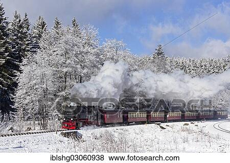 "Brockenbahn narrow gauge railway in a wintry landscape, Drei Annen-Hohne, Saxony-Anhalt, Germany, Europe" View Large Photo Image Stock Photo - "Brockenbahn narrow gauge railway in a wintry landscape, Drei Annen-Hohne, Saxony-Anhalt, Germany, Europe". Fotosearch