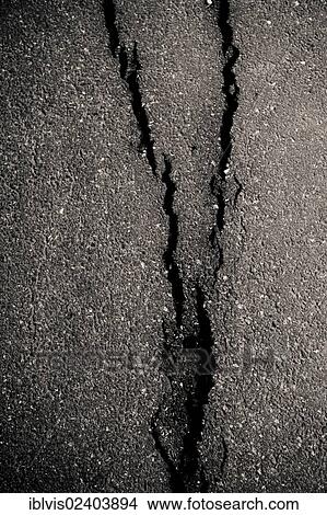 Picture - Broken asphalt. Fotosearch