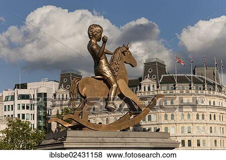 "Bronze boy on a rocking horse by Elmgreen & Dragset, Trafalgar Square, London, England, United Kingdom, Europe" View Large Photo Image Stock Photo - "Bronze boy on a rocking horse by Elmgreen & Dragset, Trafalgar Square, London, England, United Kingdom, Europe". Fotosearch