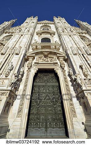 "Bronze main door with scenes from the life of Mary, sculptor Lodovico Pogliaghi, west facade of Milan Cathedral or Duomo di Santa Maria Nascente, Milan, Lombardy, Italy, Europe" View Large Photo Image Stock Image - "Bronze main door with scenes from the life of Mary, sculptor Lodovico Pogliaghi, west facade of Milan Cathedral or Duomo di Santa Maria Nascente, Milan, Lombardy, Italy, Europe". Fotosearch